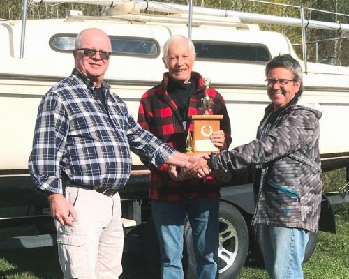 Rod Brandon (L) and Rodger Cooper (C) are presented the 2021 Mazinaw Cup by Dennis Richard (R)